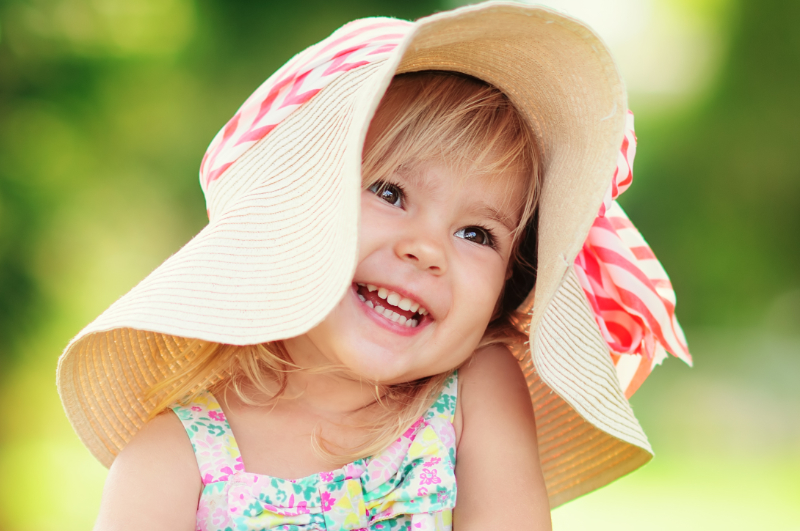Portrait of a happy little girl outdoor